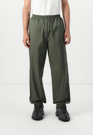 UNISEX - Trousers - green blackish