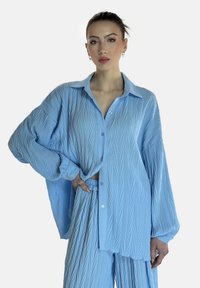 Elara LANGESSET - Pantalon classique - blau