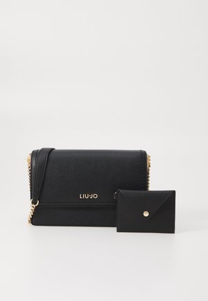 CROSSBODY - Cross body bag - nero