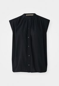 Chemise noire à manches courtes avec un col mandarin, présentant des plis verticaux et une fermeture à boutons sur toute la longueur. Tissu doux avec une texture lisse.