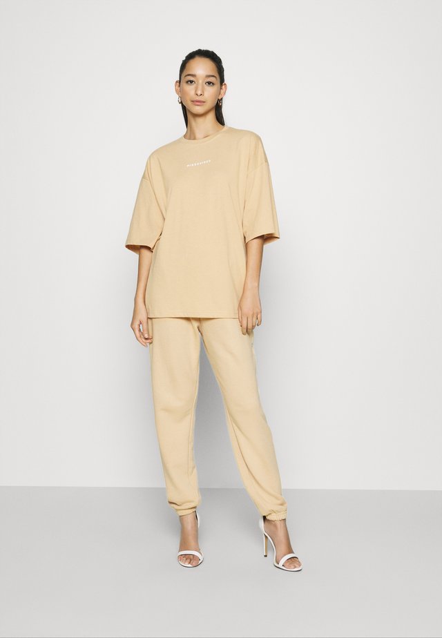 OVERSIZED SET - Pantalon de survêtement - beige