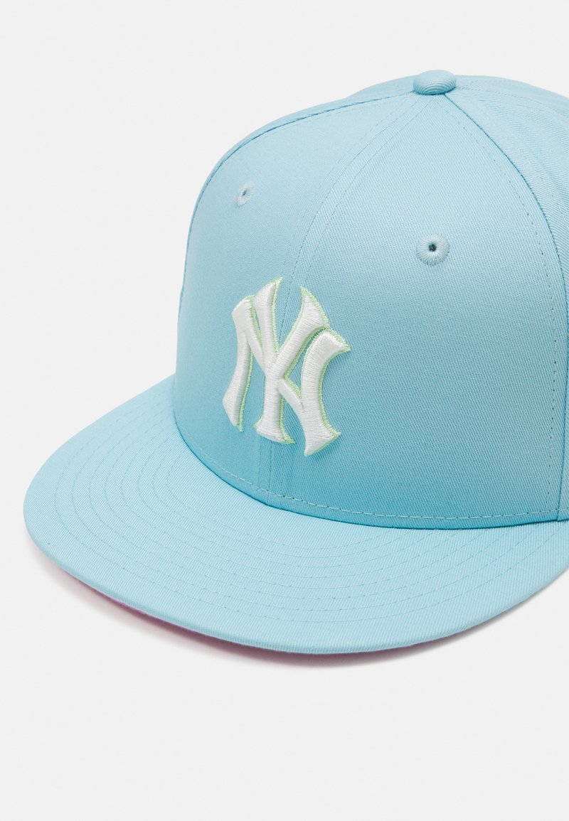 ny hat with patches
