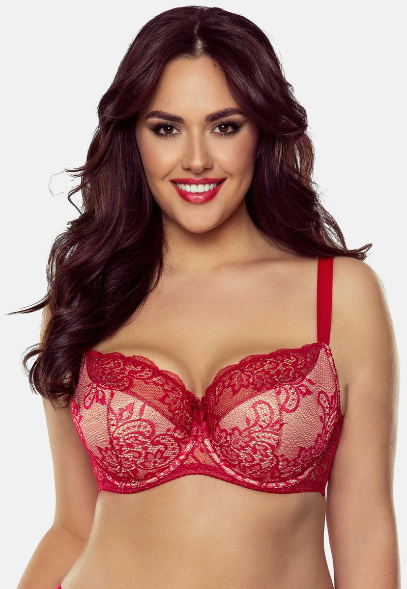 Red lace balconette bra with sheer mesh cups, floral pattern, underwire support, and adjustable straps. Center tie detail adds interest.