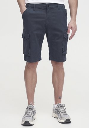 Navy cargo shorts made of sturdy fabric, featuring two side pockets, flat front, and a relaxed fit. Detailed stitching along the hem.