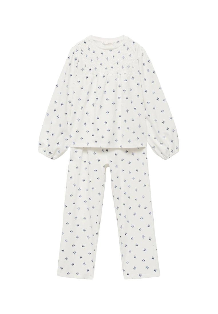 Bombažna pidžama, ki vključuje dolgo sleeves majico in hlače. Bela podlaga z modrim cvetličnim vzorcem, nabrana nedrčka in elastični manšeti.