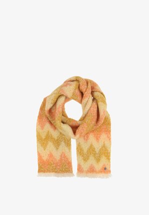 Gyapjú sál, amely cikk-cakk mintával rendelkezik barack, sárga és krémszín árnyalatokban. Puha tapintás, bojtokkal ellátott szélek és egy kis logó címke.