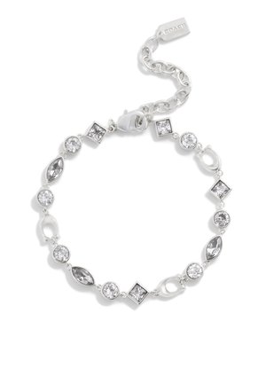 Srebrna bransoletka z naprzemiennie ułożonymi okrągłymi, kwadratowymi i markizowymi przezroczystymi kryształami oraz regulowanym zapięciem łańcuszkowym z zawieszką Coach.