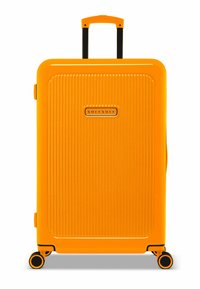 Harde koffer in feloranje. Heeft een verticale ribbelstructuur, zwarte handgreep en wielen. "SUITSUIT" logo aan de voorkant.