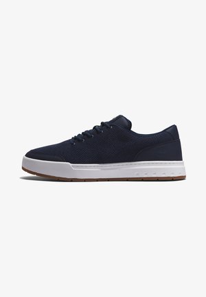Navy blue athletic shoes with a mesh upper, white midsole, and gum rubber outsole. Features round laces and minimal branding details.