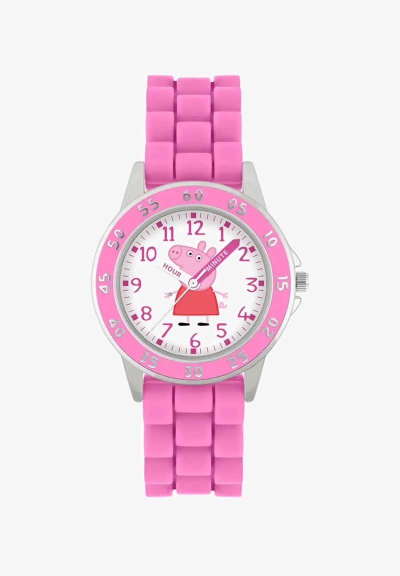 Montre pour enfants avec un bracelet en caoutchouc rose, un boîtier rond en argent, un cadran blanc, des accents roses, présentant un personnage de cochon de dessin animé et de grands marqueurs d'heure.