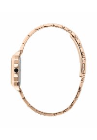 Orologio in oro rosa con quadrante rettangolare, cinturino curvo e design a maglie. Pulsante quadrato sul lato, superficie liscia e aspetto minimalista.