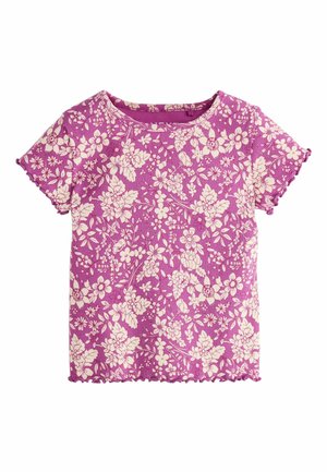 Krátky rukáv, rebrované bavlnené tričko v žiarivej fialovej farbe s kvetinovým vzorom v krémovej farbe a s oblými okrajmi na rukávoch a spodnom leme.
