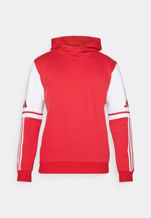 Rød hoodie med en ensfarvet front, hvide ærmer og tre hvide striber langs armene. Har en kængurulomme og hætte.