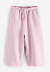 Rosa bomullsshorts med elastisk midjeband och snörning. Har sidofickor och en liten logotyp-patch nära midjan.
