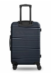 Maleta rígida de color azul marino con diseño de rayas verticales, asa retráctil, dos ruedas laterales y una superficie texturizada para un mejor agarre.