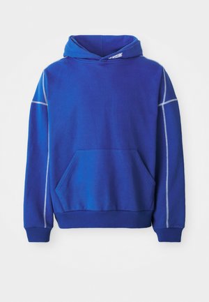 Blue hoodie made of soft fabric, featuring a kangaroo pocket, drawstring hood, and contrasting light blue stitching along the seams.