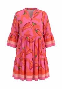 Pink dress with three-quarter bell sleeves and tiered skirt, patterned with large red chili peppers and orange stripes near the hem and sleeves.