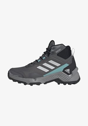 Szaro-czarny but trekkingowy Adidas Rain RDY z jasnoniebieskimi akcentami i wytrzymałą podeszwą, zaprojektowany do użytku na zewnątrz.