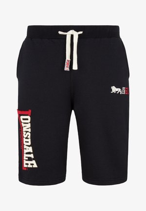 Mustad mustad lühikesed püksid, mis on valmistatud puuvillast, kummist vöökohaga ja nööriga. Vasakul jalal on punane ja kreemikas "LONSDALE" logo ning kaunistused.