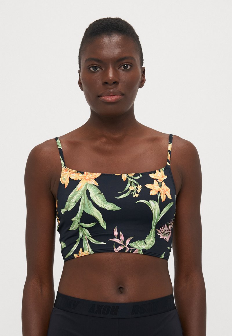 Květinový crop top s tenkými ramínky, námořnický pozadí, s zelenými listy a oranžovými květy, hladká textura a zkrácený silueta.