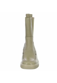 Beige Leder Stiefeletten mit glatter Oberfläche, runder Spitze und elastischen Seitenpanelen. Hat eine robuste Gummisohle.