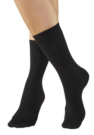 Black cotton socks with a ribbed cuff, smooth texture, and a standard crew length design, displayed on crossed legs.