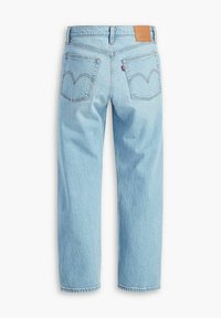 Light blue denim jeans with a relaxed fit, featuring a straight leg, visible stitching, two back pockets, and a leather brand patch at the waist.