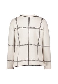 Beige sweater with a grid pattern, featuring dark brown stitching. Relaxed fit with a rounded neckline and slightly tapered sleeves.