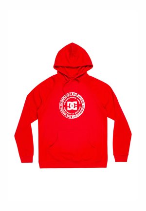 Red hooded sweatshirt made of soft fabric. Features a front pocket and a circular white logo design. Ribbed cuffs and hem.