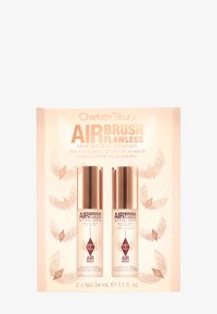 Charlotte Tilbury Airbrush Flawless Mini Setting Spray Kit, featuring two transparent bottles with gold accents, packaged in a pink box.