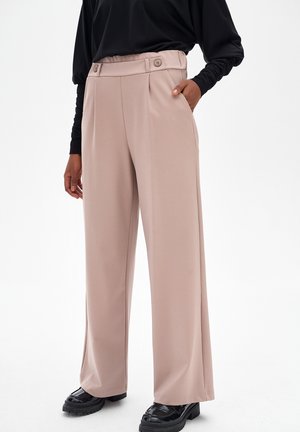 - Spodnie materiałowe