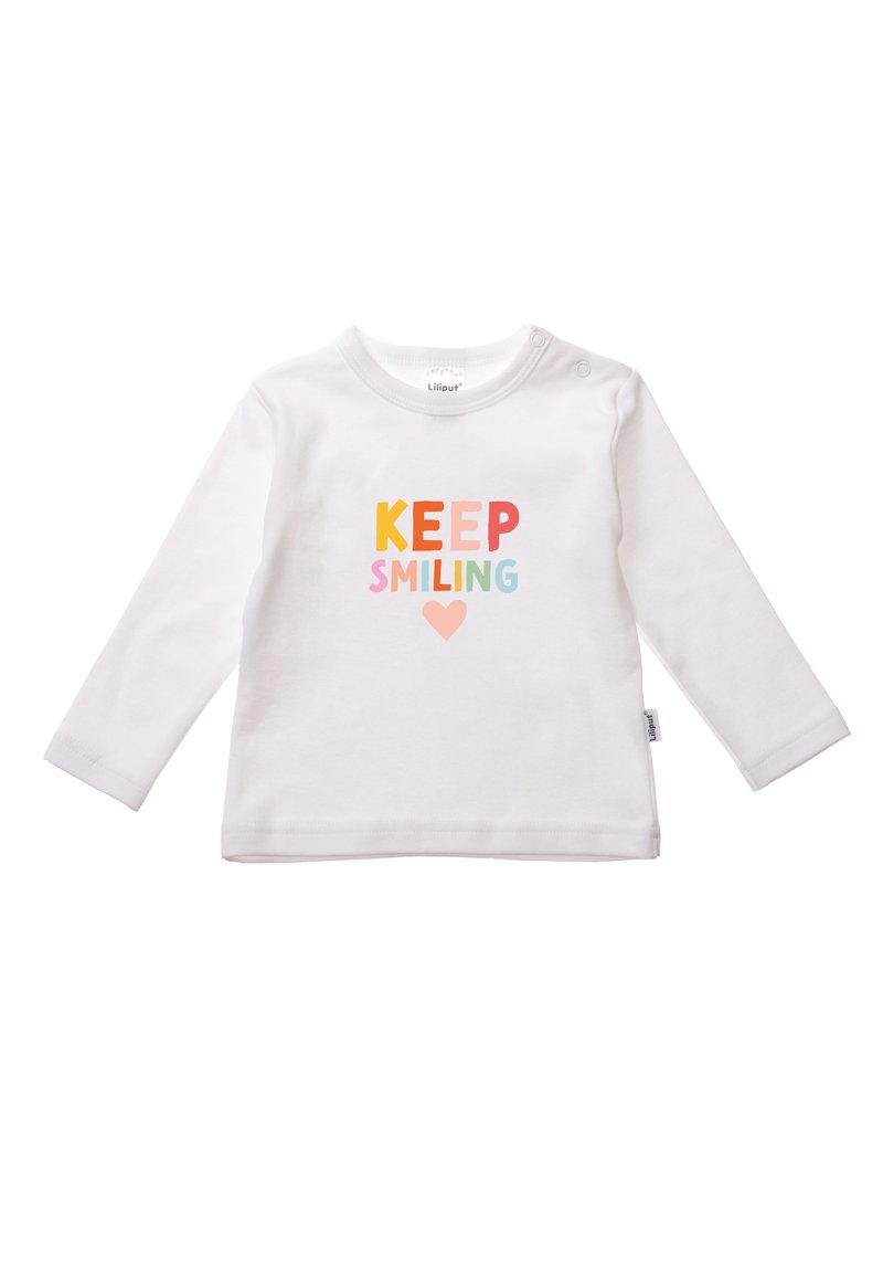 Weißes Langarmhemd mit dem Text "KEEP SMILING" in bunten Buchstaben und einem Herzsymbol darunter. Aus weichem Baumwollmaterial.