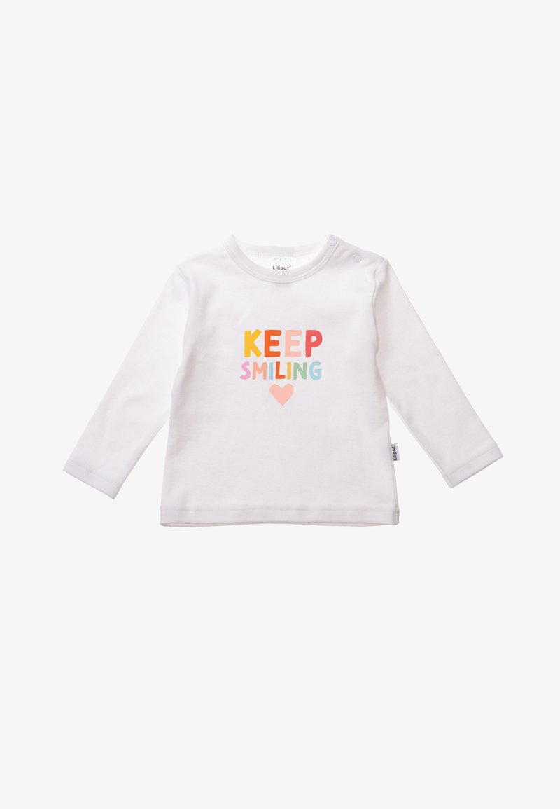 Weißes Langarmhemd mit dem Text "KEEP SMILING" in bunten Buchstaben und einem Herzsymbol darunter. Aus weichem Baumwollmaterial.