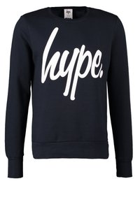 Sweat-shirt bleu marine à manches longues et col rond avec une grande inscription blanche « hype. » imprimée sur le devant.