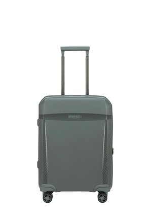 Valise rigide grise avec une poignée rétractable, des accents texturés sur les côtés et quatre roues pour une meilleure mobilité. Présente la marque EPIC sur le devant.