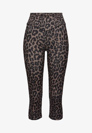 Leopard-print capri leggings in stretchy, smooth fabric with a high, wide waistband. Black spots on a brown background. Seam detailing visible.