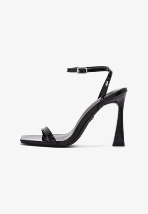 Black patent leather high-heeled sandal with a square toe, slim ankle strap, and a shiny finish, featuring a stiletto heel.