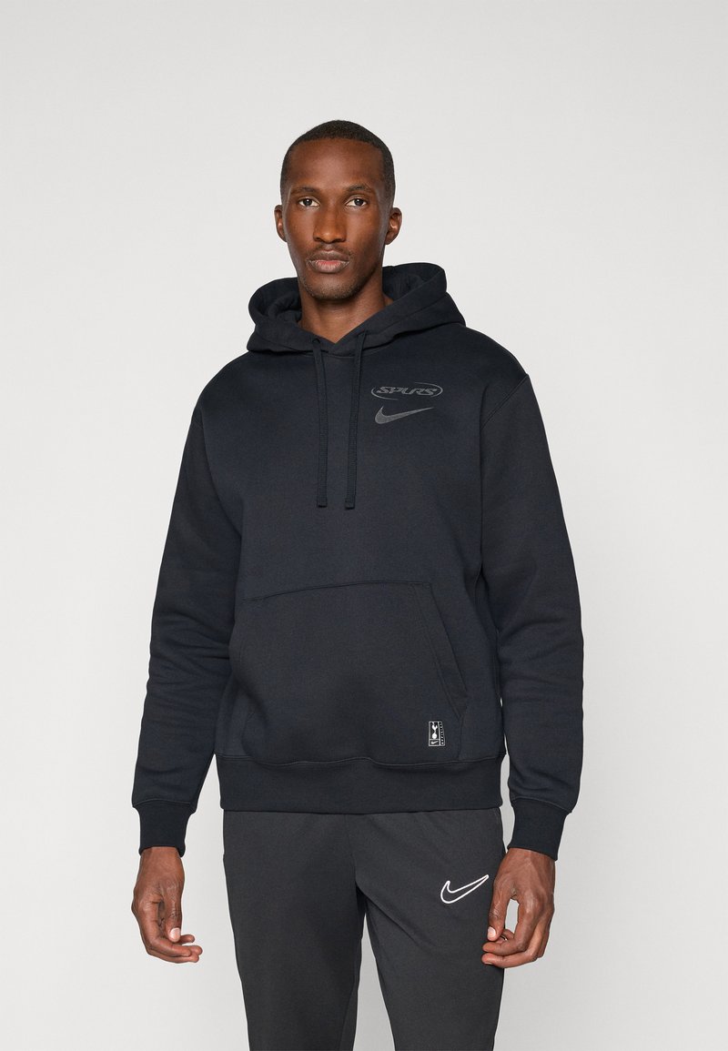 Black Nike hoodie with a front pocket, drawstrings, and a subtle logo print. Fabric appears soft and textured, suitable for casual wear.