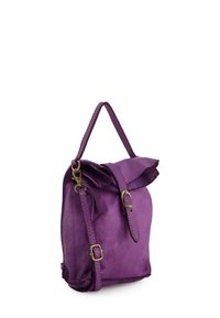 Purple leather handbag with a top handle, adjustable shoulder strap, and a flap secured by a buckle closure.