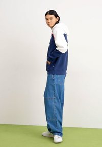 New Balance CLASSICS HOODIE - Jersey con capucha - navy