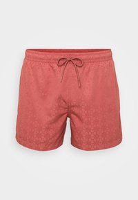 Røde svømshorts med et geometrisk mønster, elastisk talje og snøre lukning. Lavet af letvægts, hurtig-tørrende stof.