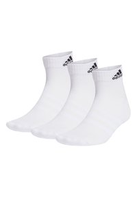White ankle socks in a pack of three, made from a soft fabric with a ribbed cuff and black logo accents at the top.