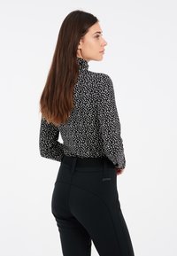 Protest PRTKACEY - Top s dlhým rukávom - true black