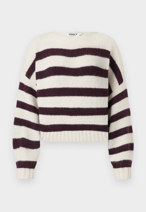 Krem- og mørk lilla stripete genser med rund hals, ribbestrikkede mansjetter og kant, laget av mykt strikket stoff. Korte ermer.