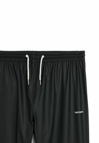 Sorte atletikshorts med elastik i taljen og hvide snore, med lille hvid "Tretorn"-logo på højre ben.