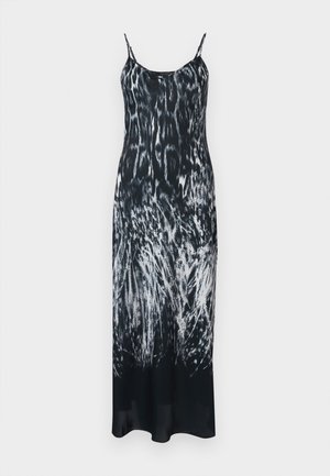 Black and white printed maxi dress with thin straps, featuring a flowing silhouette and a design resembling animal fur patterns. Soft material.