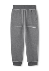 Gray sweatpants made of soft fabric with side pockets, elastic waistband, and white DKNY logo on the front, featuring contrasting stitching.