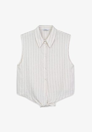 Chemise sans manches de couleur crème avec des rayures verticales, fermeture à boutons, col évasé et un détail de nœud noué à l'ourlet. Tissu texturé.