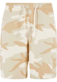 Shorts en camouflage beige en tissu doux, dotés d'une taille à cordon de serrage, d'une coupe à mi-genou et d'un mélange de motifs brun clair et crème.