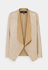 Blazer beige perforé avec un devant ouvert drapé, tissu texturé et manches longues. Dispose d'une doublure intérieure douce pour le confort.